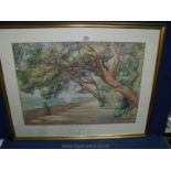 A framed and mounted Watercolour of a figure by a coastal scene, signed lower left L.