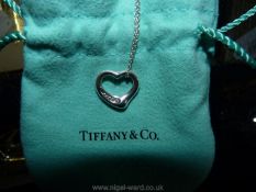 A Tiffany "open heart" diamond Necklace and earrings.