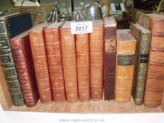 A quantity of leather bound books to include volumes of German theatre, memoirs of Mrs Moore etc.