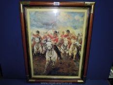 A large Print of soldiers on horses going into battle with a brass edged frame,