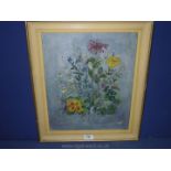 A framed oil on board of a floral scene , initialled lower right, J.C.B., 17'' x 20''.