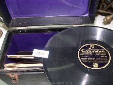 A black case containing 17 Rpm records to include Gunga Din and his lute, Someday, Somewhere,