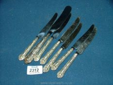 A set of six silver handled Tea Knives, Sheffield 1971, Harrison Bros. and a butter knife.