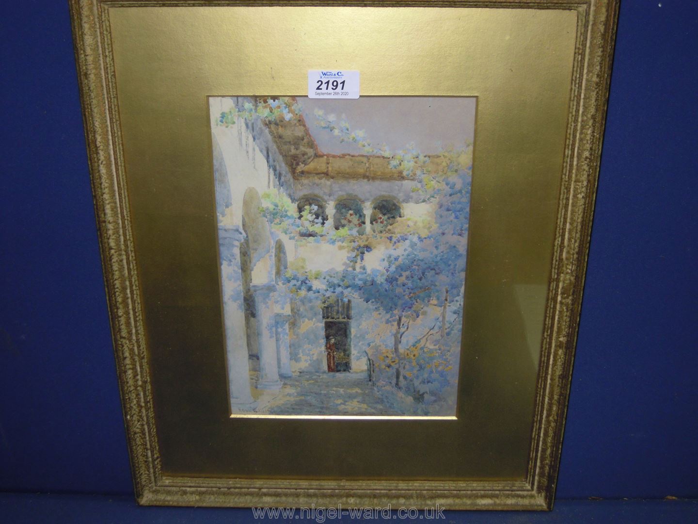 A gilt framed and mounted watercolour of a Monastery Courtyard, signed lower right Rosa Wallis,