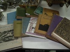 A quantity of books including Down the River by H.E.