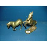Two brass horses
