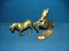 Two brass horses