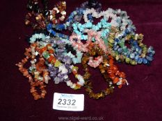 A quantity of gemstone bracelets.