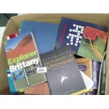 A box of books to include crossword companions, dictionary of euphemisms, dictionaries etc.
