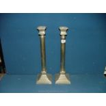 A pair of large Brass Candlesticks with square tops, 18 3/4'' tall.