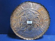 A Glasgow School Arts and Crafts Celtic design embossed copper Dish,