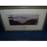 A framed and mounted Watercolour of a Mountain scene indistinctly signed to the right.