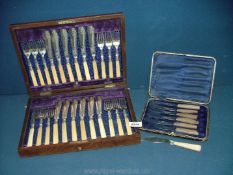 A boxed Canteen of a twelve place set of Epns FIsh cutlery and a boxed set of six wooden handled
