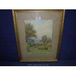 A gilt framed and mounted watercolour of a Coastal View as seen from a garden, signed lower left C.