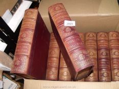 Four boxes of The Encyclopedia Britannica Ninth edition.