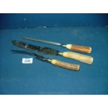 An Antler handle Carving set, steel knife and fork.