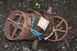 4 various cast iron chicken house wheels.