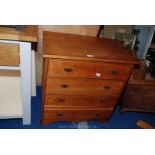 A pine four drawer chest of drawers (some handles missing). 29 1/2" x 17 1/2" x 31" high.