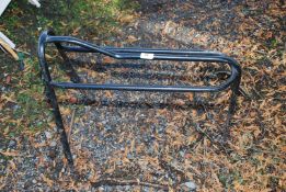 A metal saddle rack