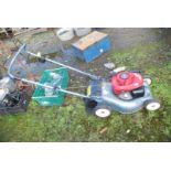 A Honda easy start Mower, petrol.