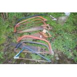 A quantity of bow saws, hand saws, etc.