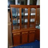 A teak triple glazed unit on a three drawer cupboard. 48" long x 75" high x 18" deep.