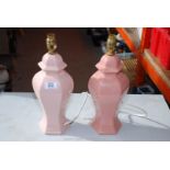 Two pink pottery table lamps.