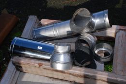 A quantity of new steel flu pipes and collars