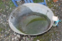 A galvanised tin Bath,