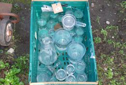 A quantity of glass jugs,