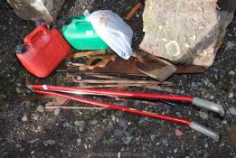 Two petrol cans, lawn edging shears, tools,