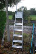 A 5 rung Aliuminium step ladder.