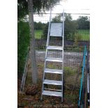 A 5 rung Aliuminium step ladder.