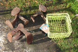 A pond plant basket and three cobbler's lasts.