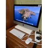 A 21.5 inch Apple iMac Desktop Computer (Late 2013 model)