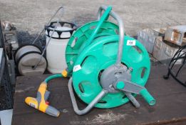 A garden hose on reel.