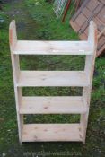 A stripped Pine four shelf display stand, 41" high x 23" wide x 9" deep.