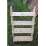 A stripped Pine four shelf display stand, 41" high x 23" wide x 9" deep.