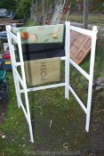 A three section painted clothes Horse and mats.