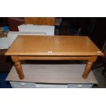 A solid light Oak coffee table, 39" x 17" x 17" high, makers stamp No.