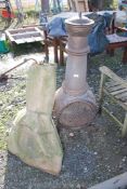 A chiminea with cover