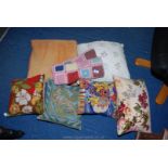 A quantity of tapestry cushions, woolen blanket, etc.