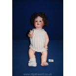 An Armand Marseille bisque headed character Doll with open and closing eyes,