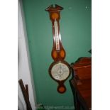 An inlaid Banjo Barometer by Short & Mason of London, with decorative edge and "Tyco's stormoguide",