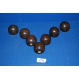 Seven small Victorian turned hardwood bowls (carpet bowls),