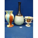 A large onion shaped specimen vase, a tri-coloured vase and a Palissy urn shaped vase.