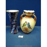 A Sarreguemines Art nouveau sleeve vase decorated in blue,