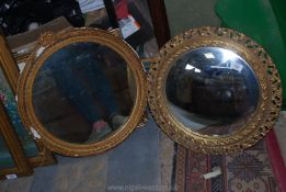 A gilt plaster circular Mirror.