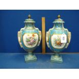 A pair of turquoise ground Sevres lidded Vases with figurative and floral panels,