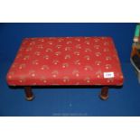 A rectangular low Footstool having turned legs,